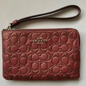 COACH Wristlet in burgundy